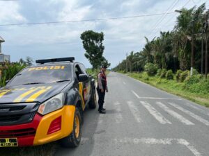 Patroli Presisi Polres Batu Bara Jaga Keamanan di Simpang Tanah Hitam Hulu