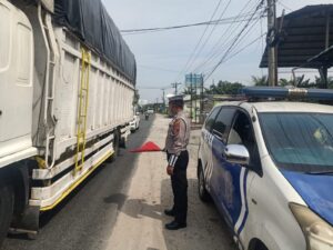 Sat Lantas Polres Batu Bara Patroli Kibas Bendera, Jamin Kelancaran dan Keamanan Arus Lalu Lintas