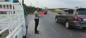 Satlantas Polres Batu Bara Patroli Kibas Bendera dan Rekam Situasi Arus Lalu Lintas