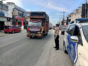 Satlantas Polres Batu Bara Tingkatkan Keamanan Lalu Lintas dengan Patroli Kibas Bendera dan Perekaman Video
