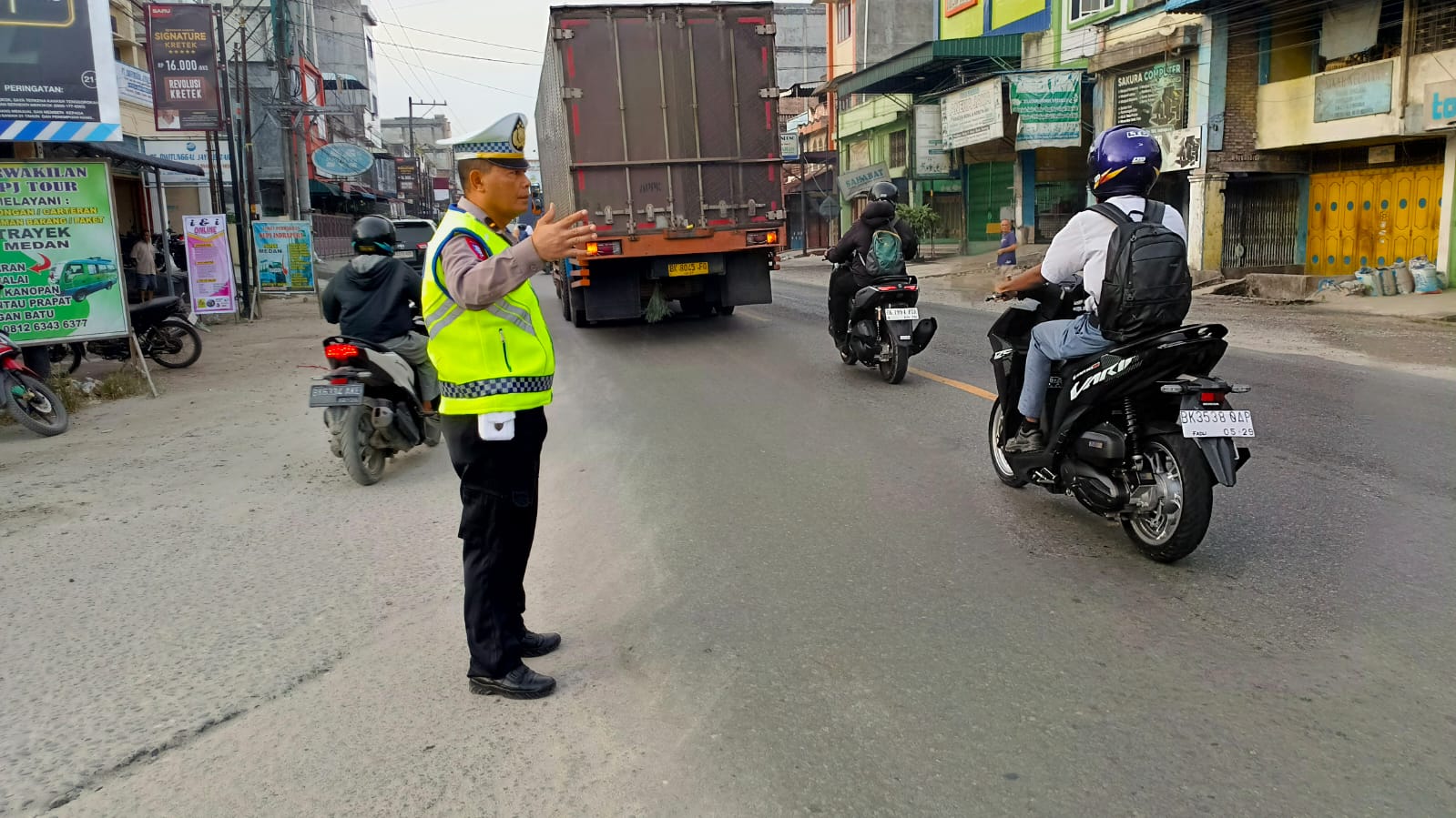 Satlantas Polres Batu Bara Atur Lalu Lintas dan Tegakkan Hukum di Beberapa Titik Rawan