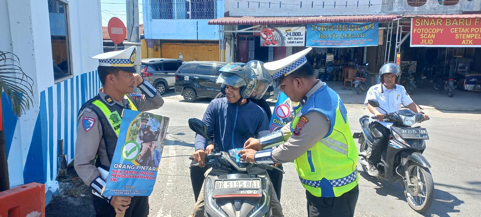 Operasi Patuh Toba 2025: Satlantas Polres Batu Bara Sosialisasikan Tertib Berlalu Lintas di Lima Puluh