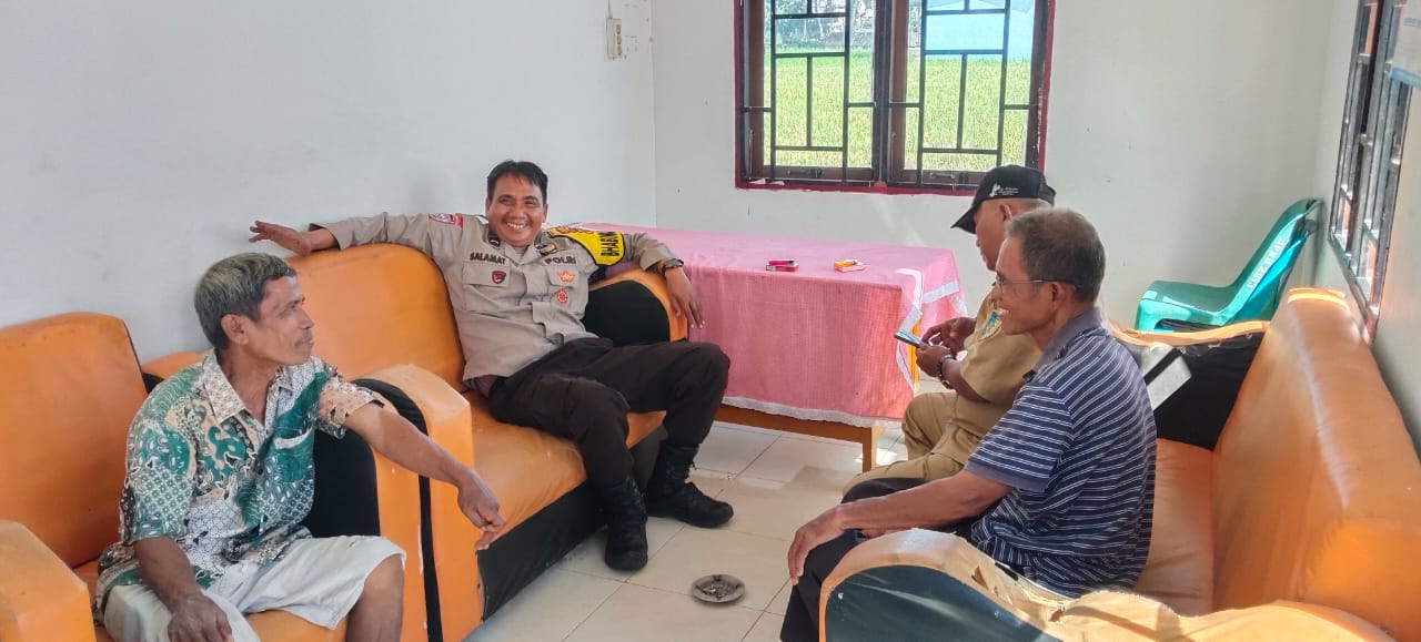 Bhabinkamtibmas Polsek Lima Puluh Tingkatkan Keamanan di Desa Pematang Tengah