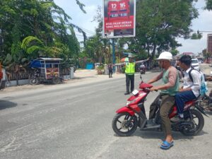 Sat Lantas Polres Batu Bara Amankan Arus Lalu Lintas di Simpang Tanah Merah