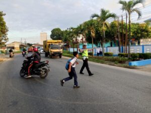 Satlantas Polres Batu Bara Atur Lalu Lintas di Titik Rawan Kecelakaan dan Kemacetan