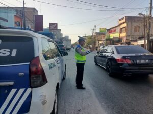 Patroli dan Kibasan Bendera: Satlantas Polres Batu Bara Jaga Kelancaran Jalinsum Indrapura