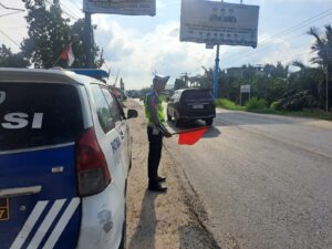 ‎Satlantas Polres Batu Bara Kembali Gelar “Patroli Kibas Bendera,” Sore Hari Aman dan Lancar Terkendali