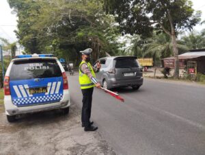 Sat Lantas Polres Batu Bara Kibarkan Bendera, Lancarkan Lalu Lintas di Titik Rawan Kecelakaan