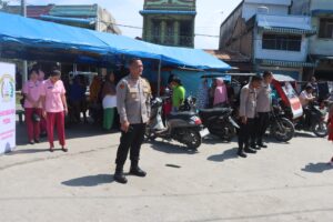 Kapolres Batu Bara Ajak Masyarakat Medang Deras Berantas Narkoba Sekaligus Berbagi Berkah Melalui Sambang dan Bantuan Makan Siang
