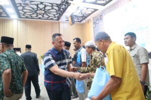 Kapolres Batu Bara Hadiri Buka Puasa Bersama Pemerintah Kabupaten, Serahkan Santunan Kepada Anak Yatim